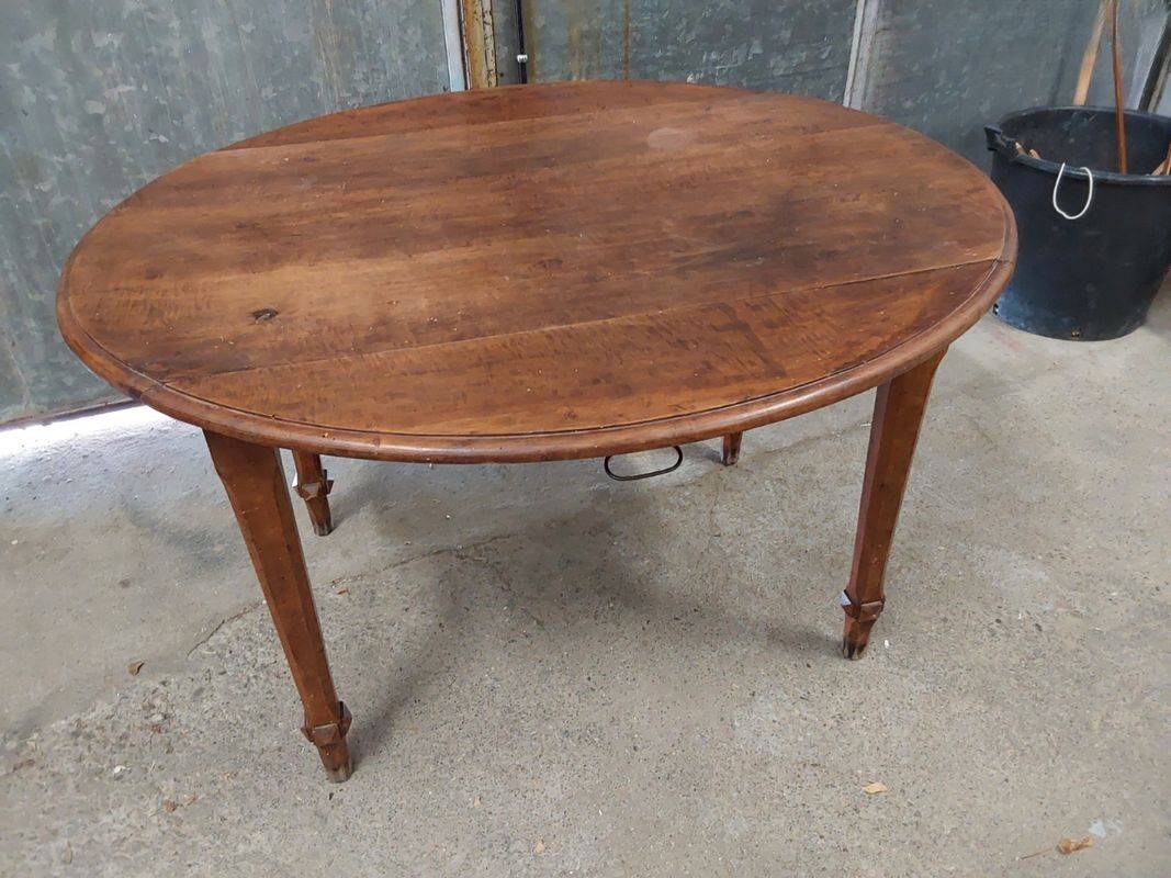Antique wooden drop-leaf table