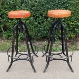 Pair of vintage metal and leather bar stools