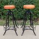 Pair of vintage metal and leather bar stools