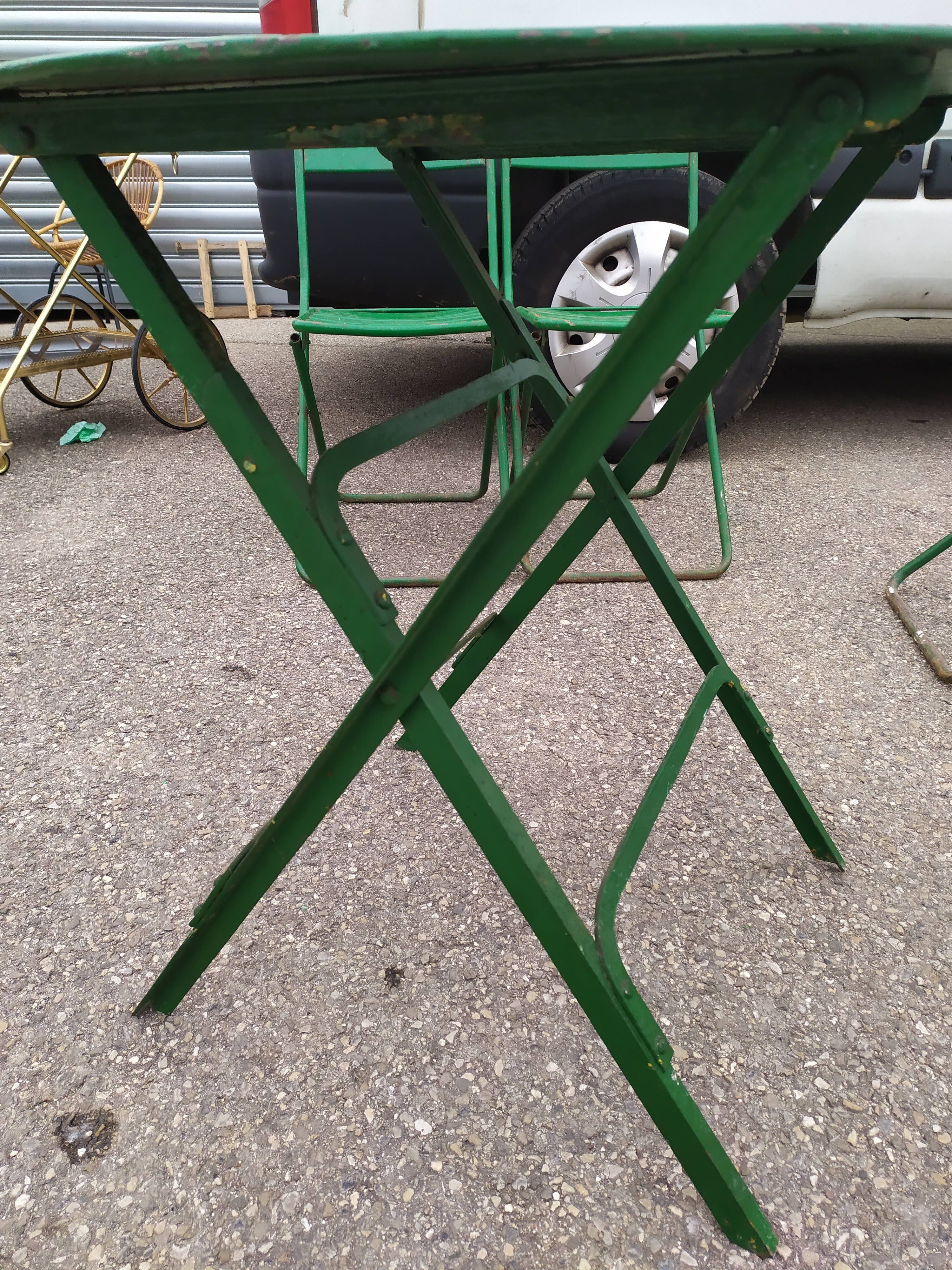 Garden set table and folding metal chairs