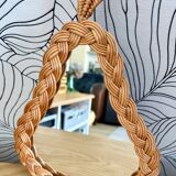 Pear-shaped woven wicker mirror