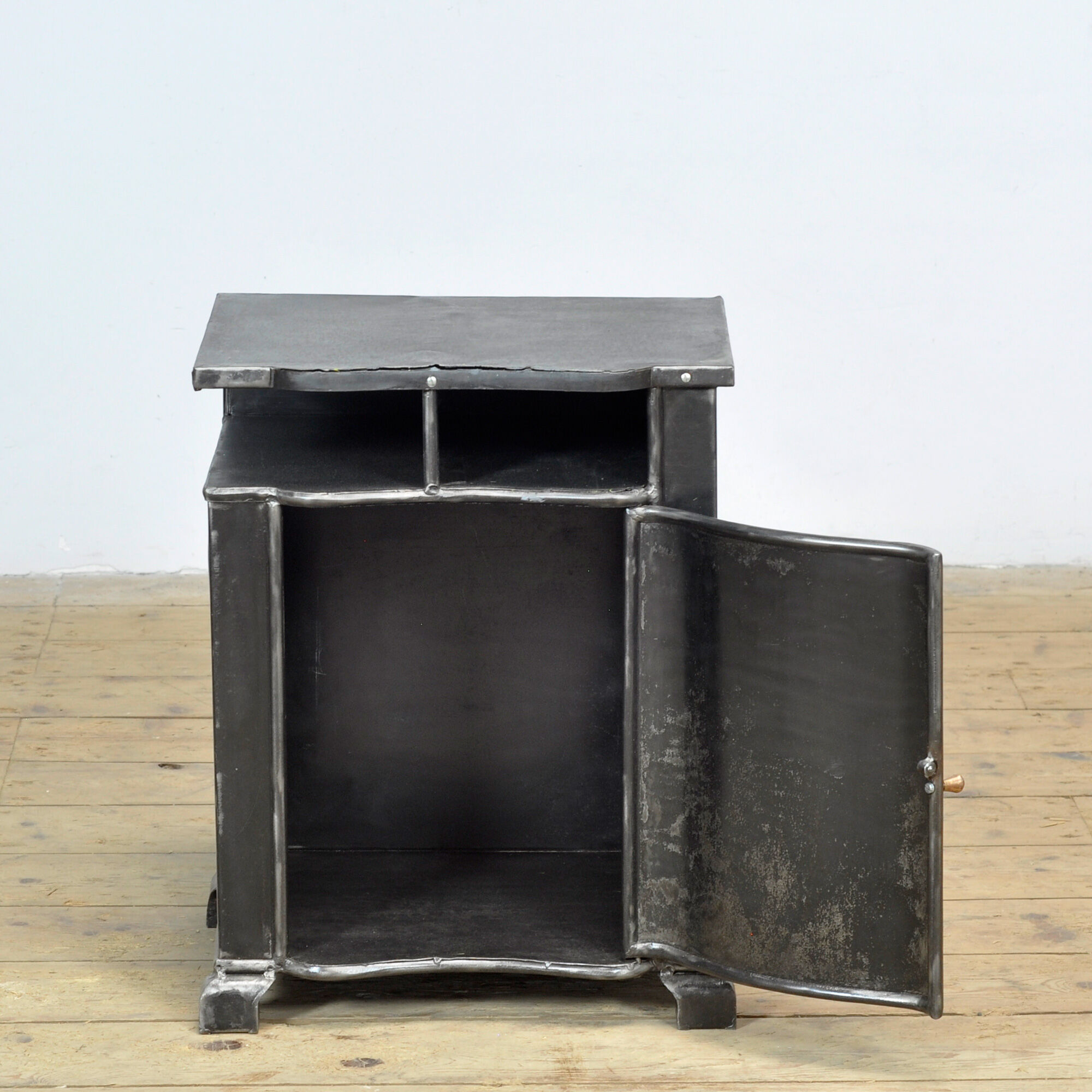 Iron bedside table, circa 1930