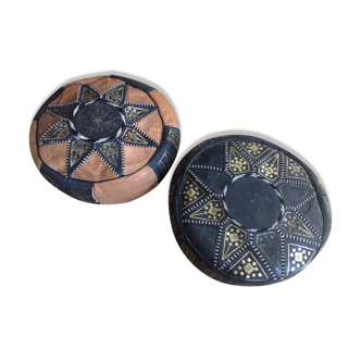 2 leather poufs