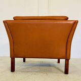 Fauteuil lounge scandinave vintage en cuir cognac, style milieu du siècle
