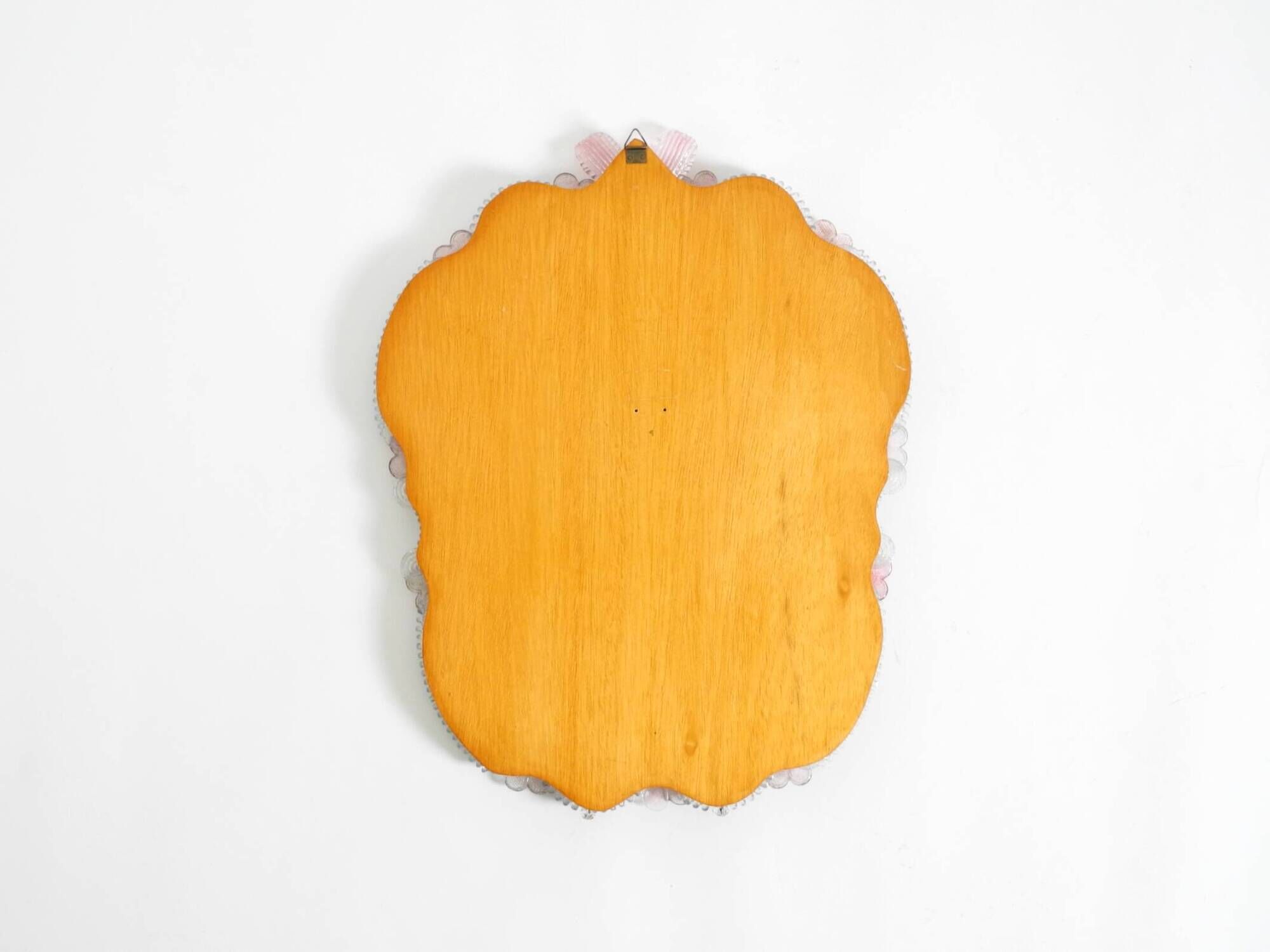 Italian mid-century wall mirror with a Murano glass frame and blossoms