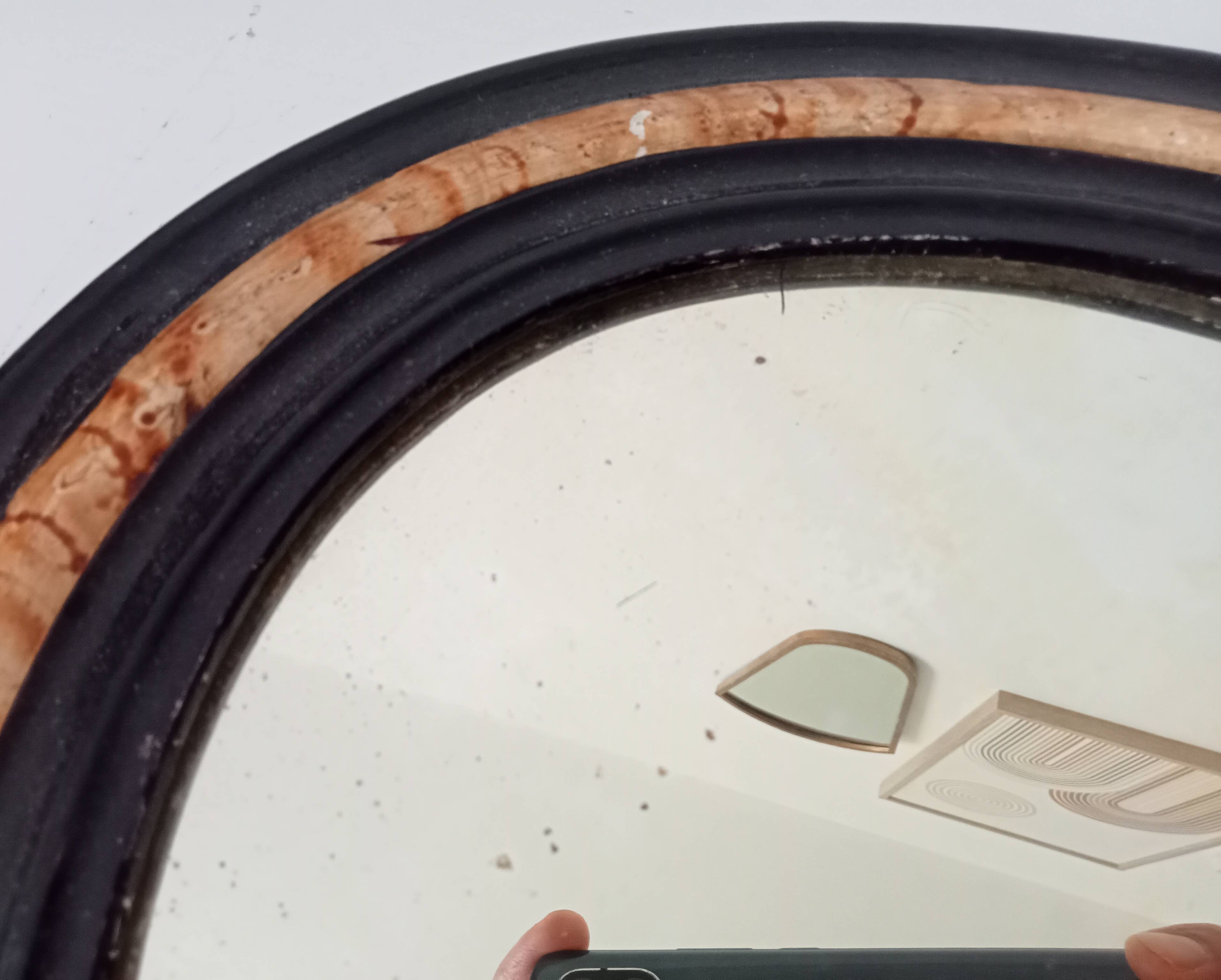 19th-century antique mirror in wood and stucco.