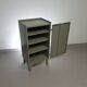 Gray metal locker. Industrial small sideboard.