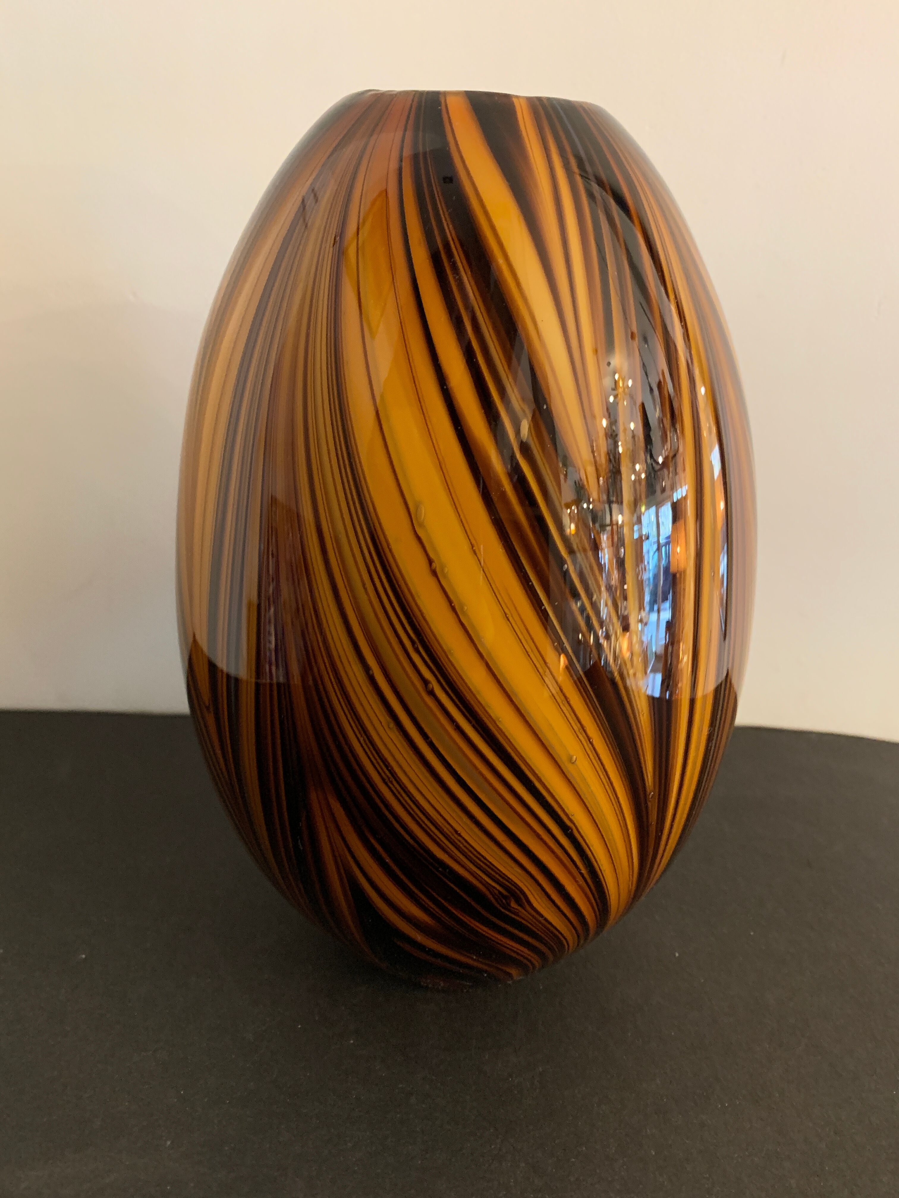 Yellow and black glass vase
