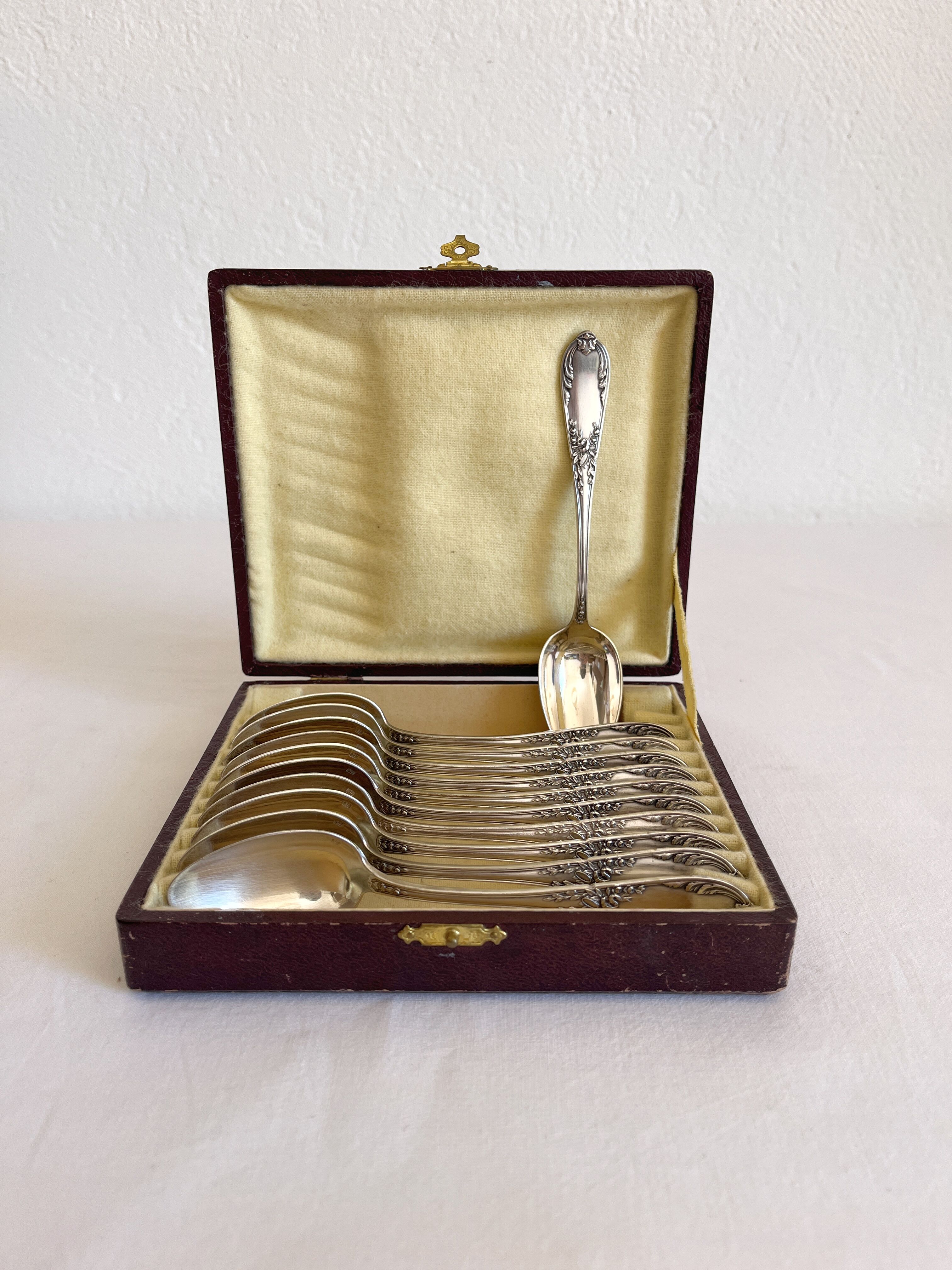 Set of 11 small vintage silver-plated metal spoons