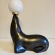Lampe otarie noire irisée bleue en terre cuite