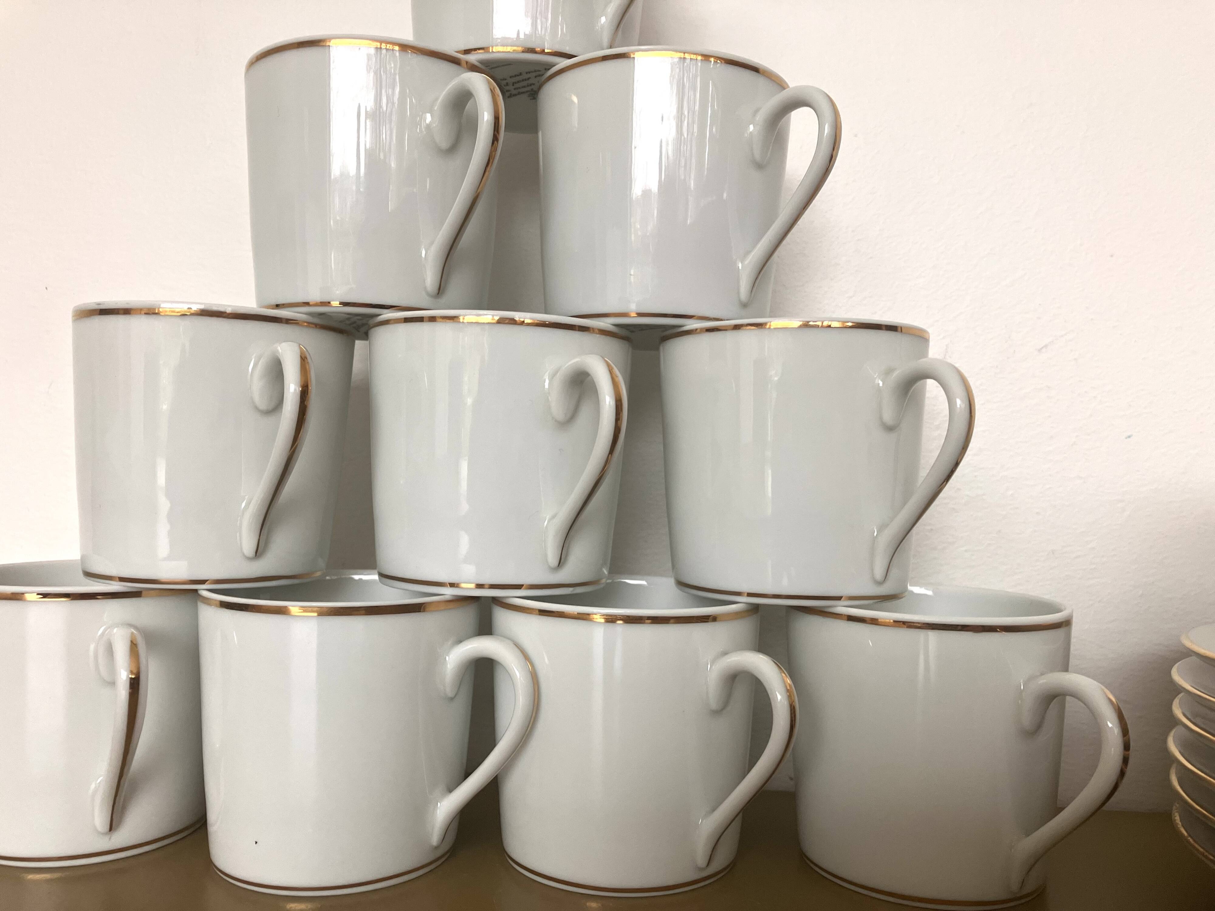 Coffee service with 11 cups and 6 saucers made of Limoges porcelain.