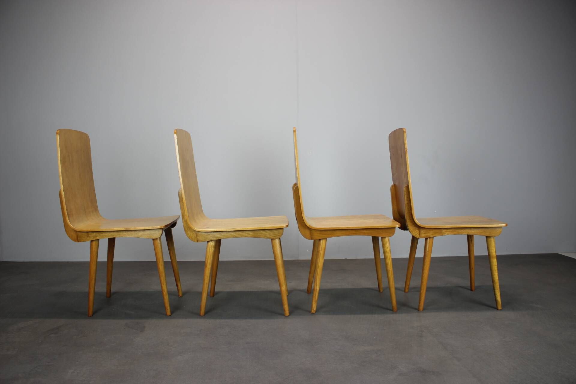 Set of 4 vintage wooden dining chairs in mid-century modern style, Europe, 1970s.