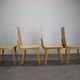 Set of 4 vintage wooden dining chairs in mid-century modern style, Europe, 1970s.