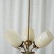 Paavo Tynell for Idman Oy, three-branch chandelier in brass and glass, mid-century, 1940s.