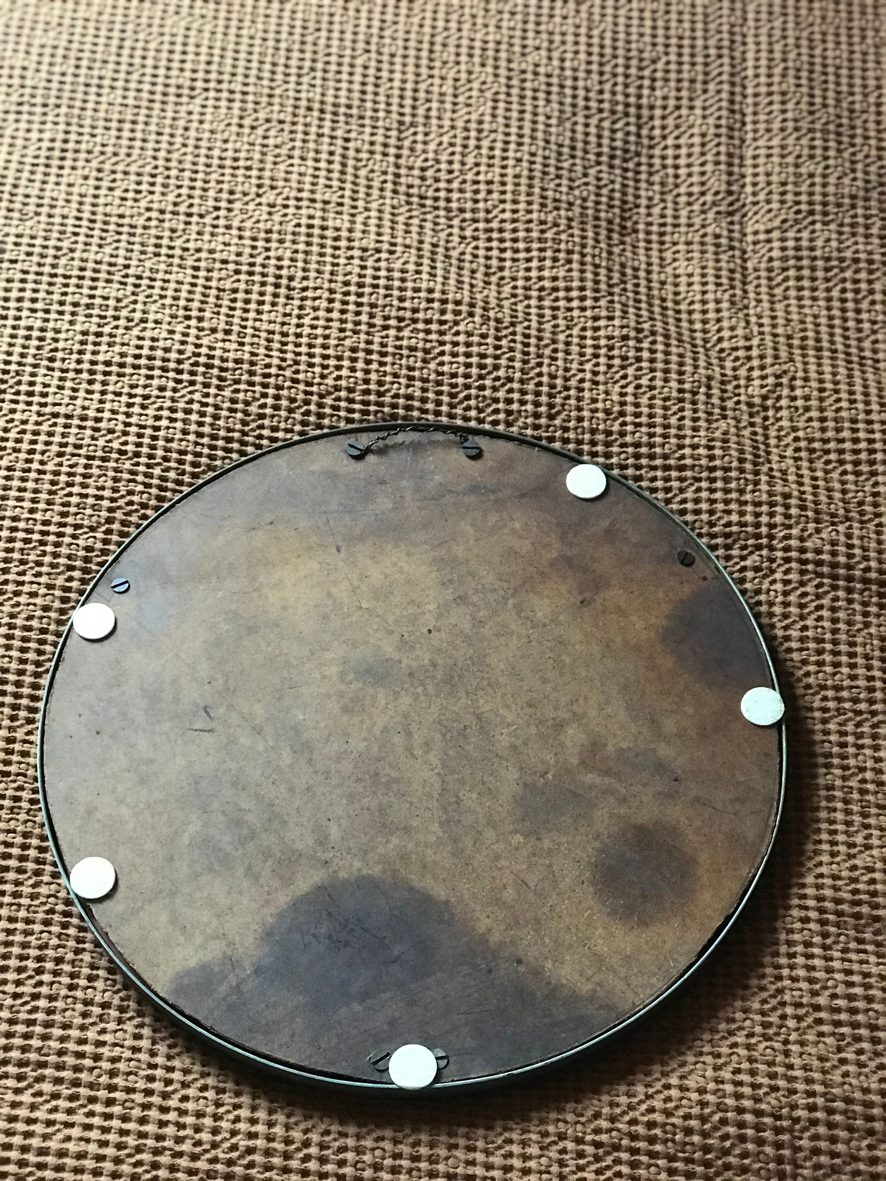 Round metal mirror
