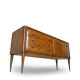Veneered burl walnut chest of drawers with light warm brown glass top
