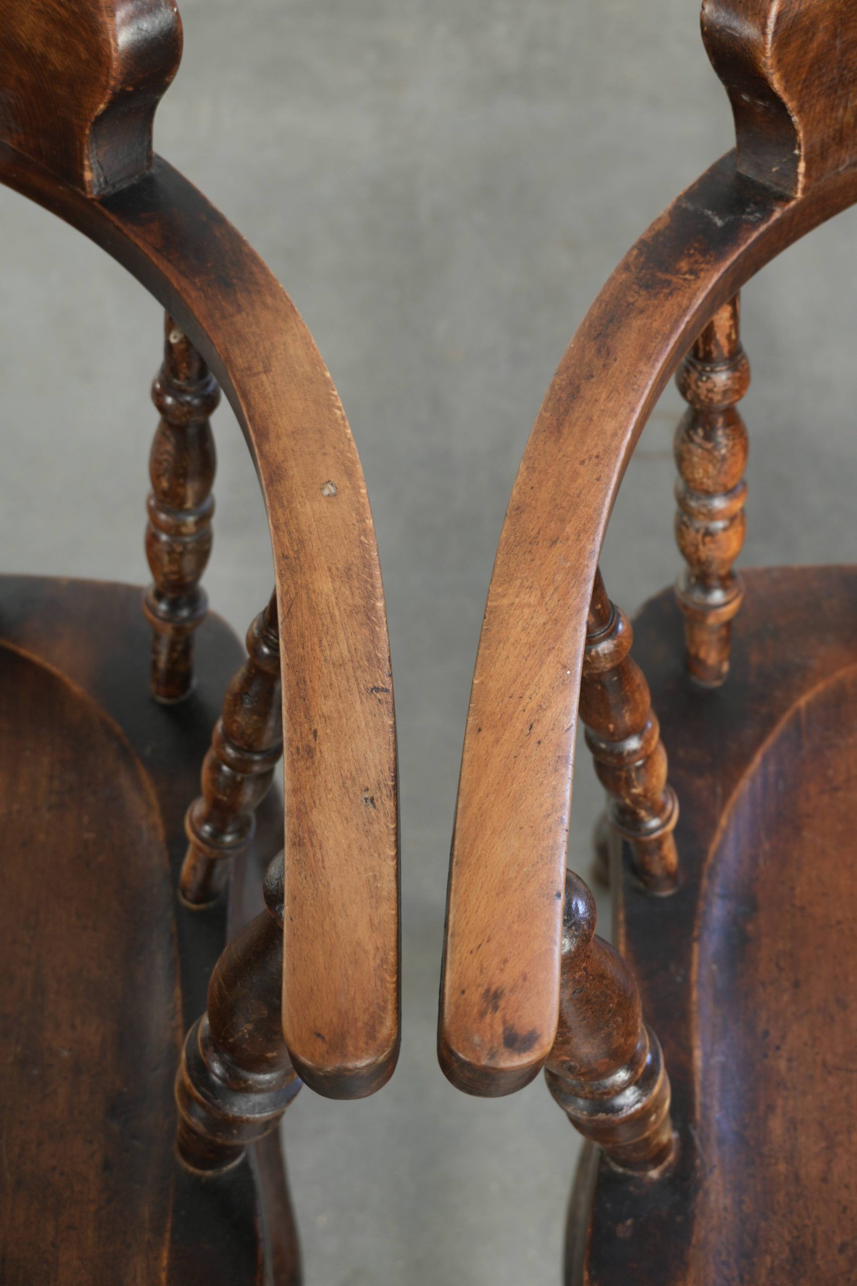 Set of four wooden English antique pub/captain chairs from the 19th century