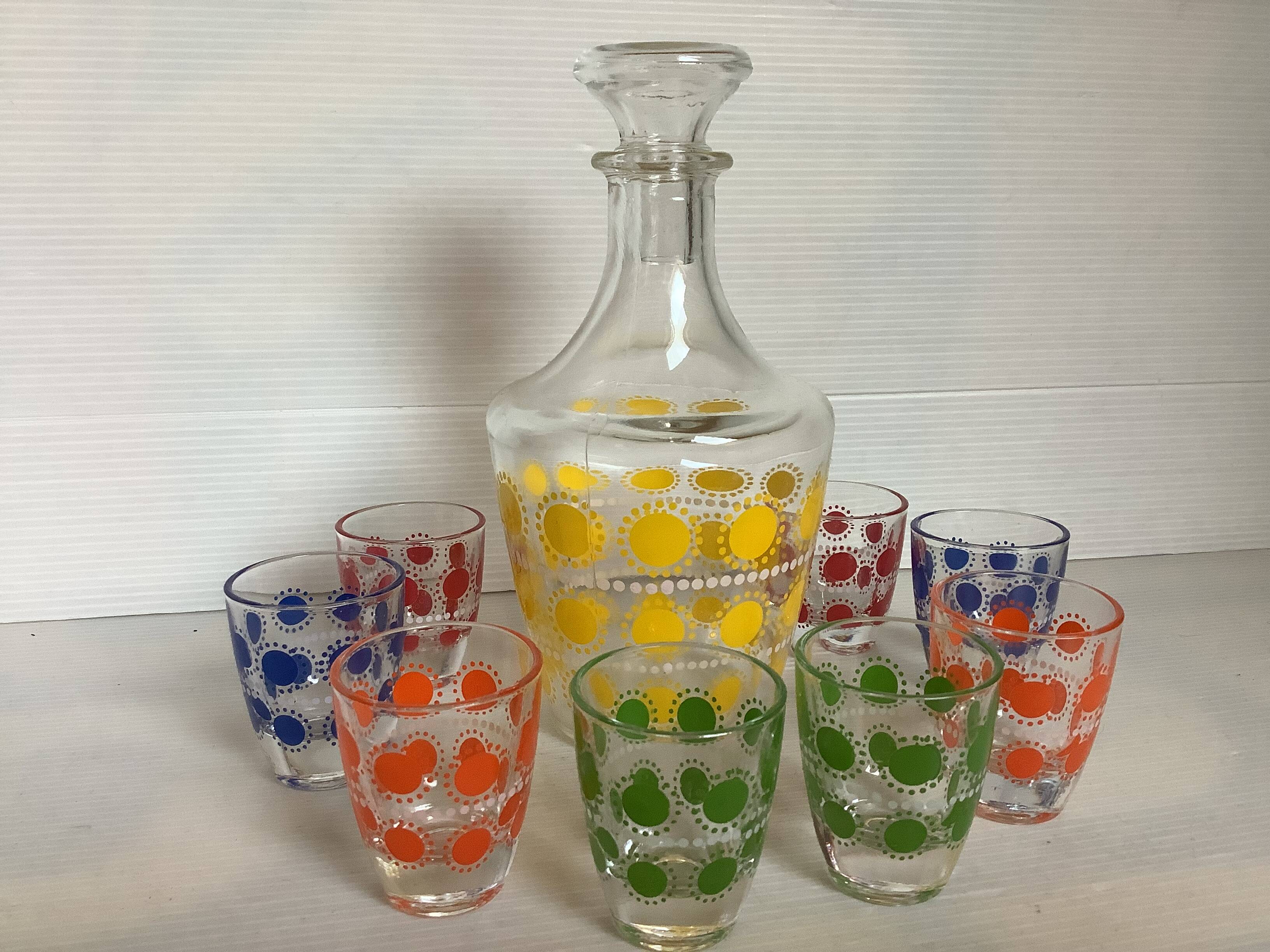 Liqueur service with multicoloured polka dot patterns.