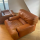 Paire de fauteuils vintage Gérard Guermonprez cuir fauve et inox, France 1970