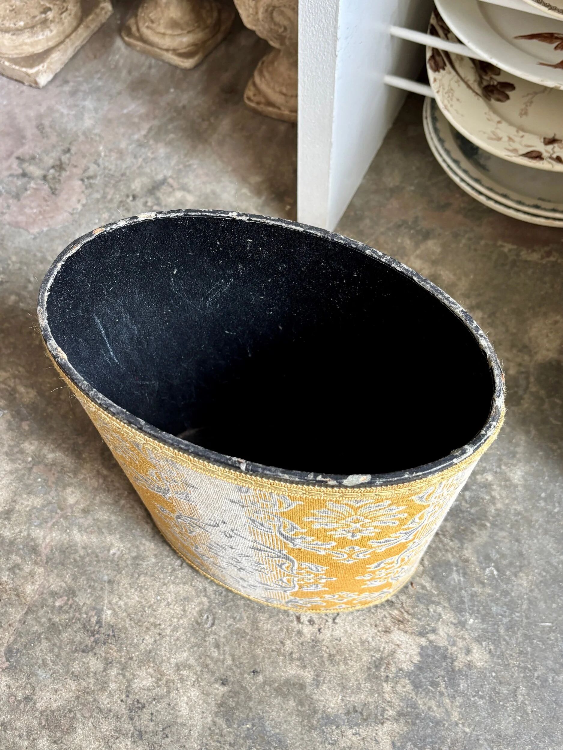 Oval paper bin in woven ochre and grey cotton