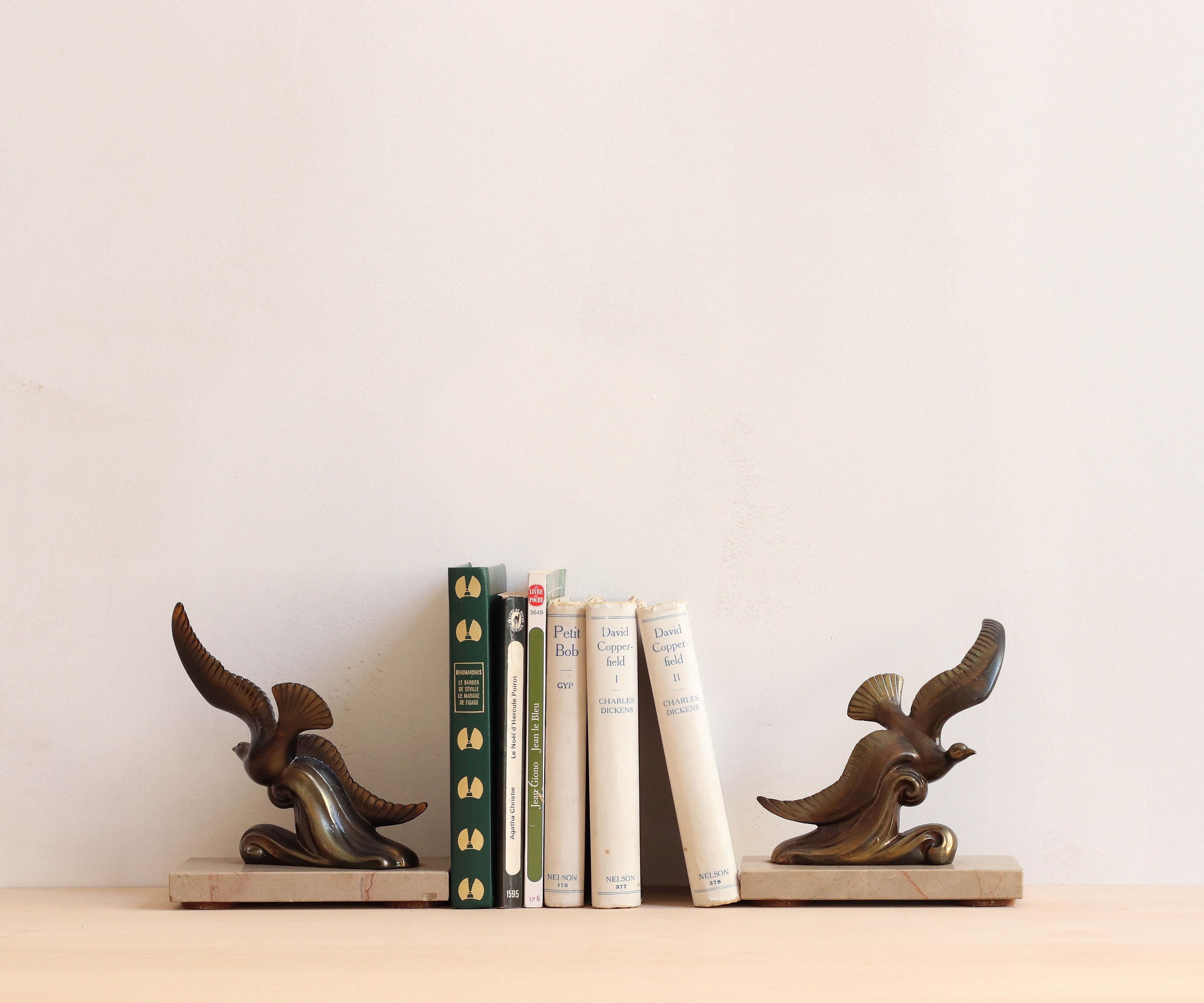 Pair of art deco seagull bookends in regulation and marble