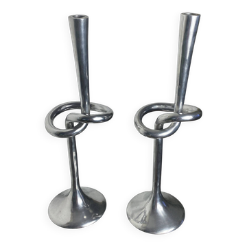Pair of large aluminium bow candlesticks, Italy, 1970.