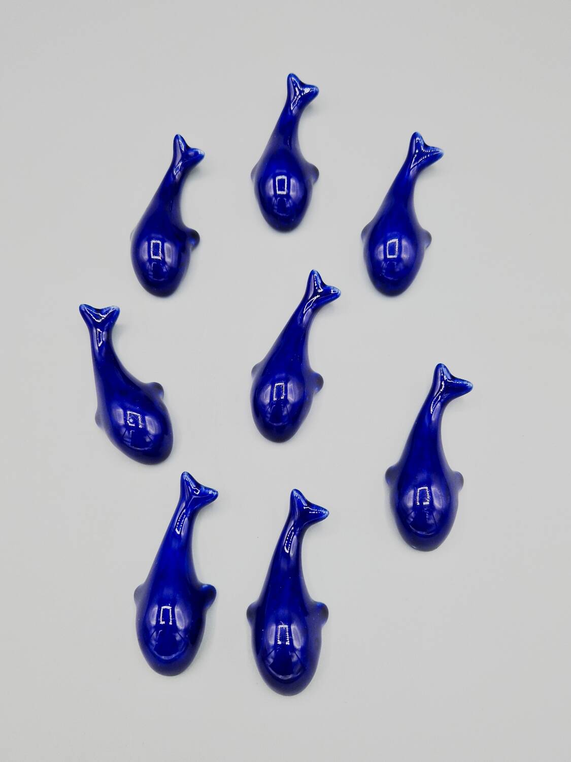 Set of 6 vintage blue porcelain whale knife rests.