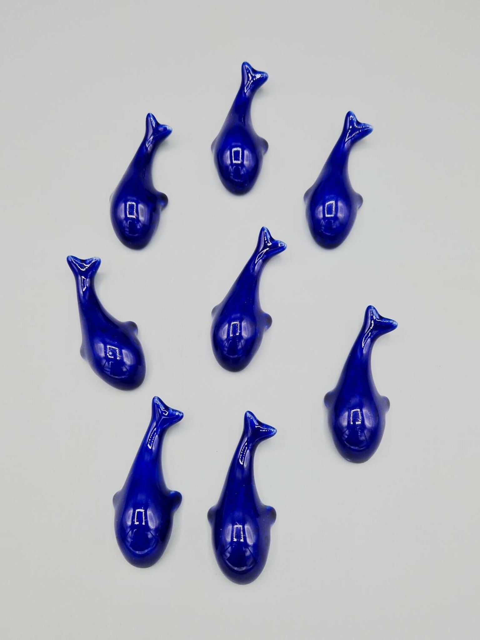 Set of 6 vintage blue porcelain whale knife rests.