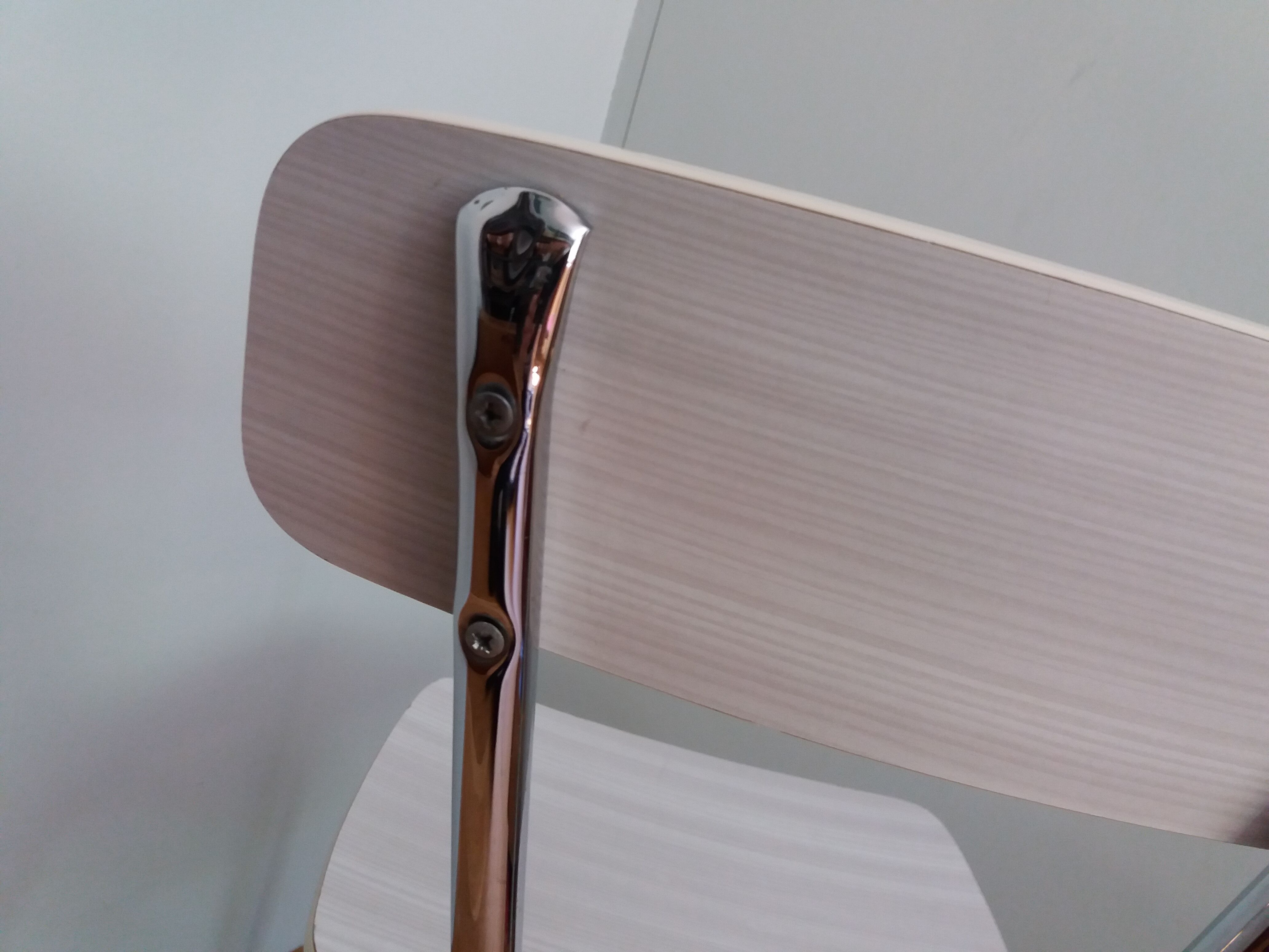 Chrome metal chair and formica white striped gray