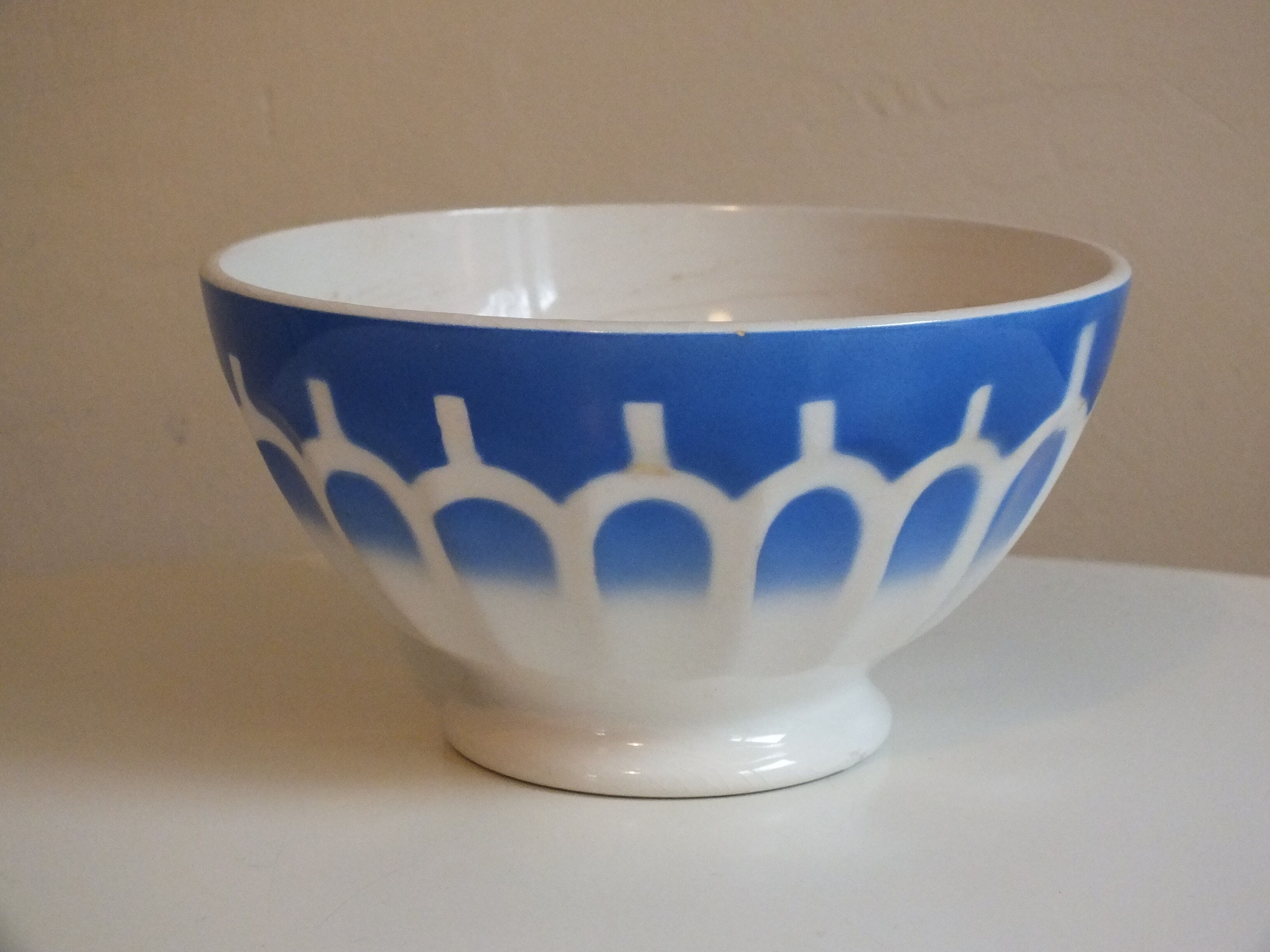 Vintage blue ribbed bowl on pedestal