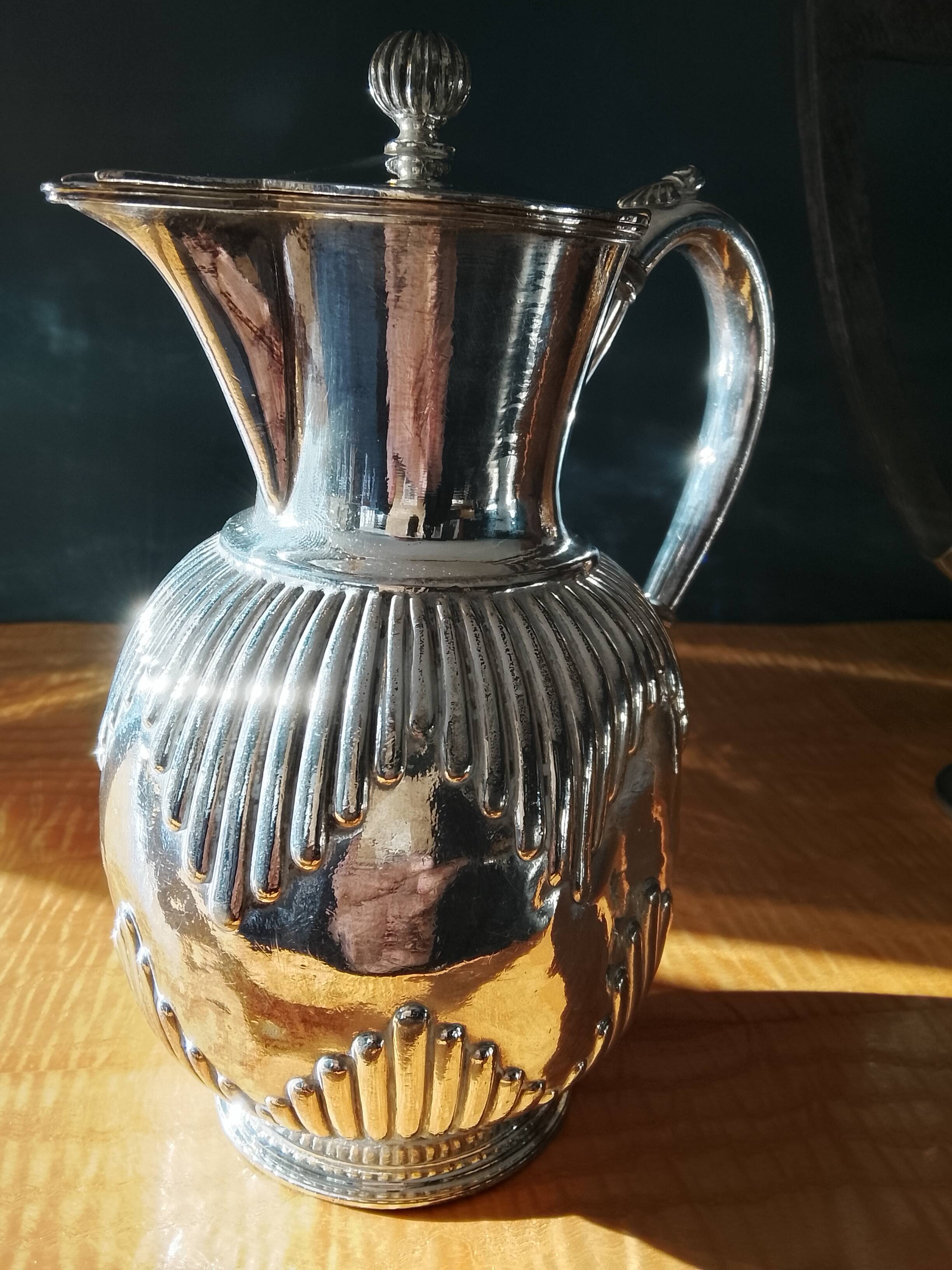 Silver-plated coffee pot and water jug. (2 items)