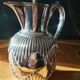 Silver-plated coffee pot and water jug. (2 items)