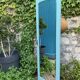 Beveled mirror on turquoise Parisian door