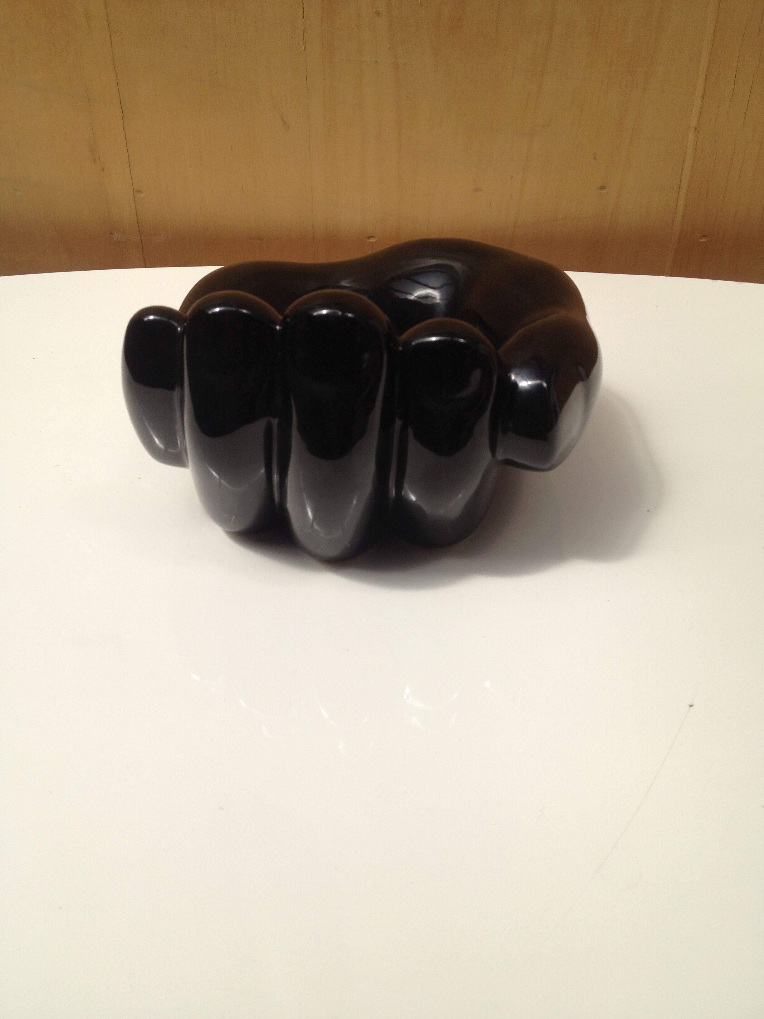 Empty ceramic hand shape pocket