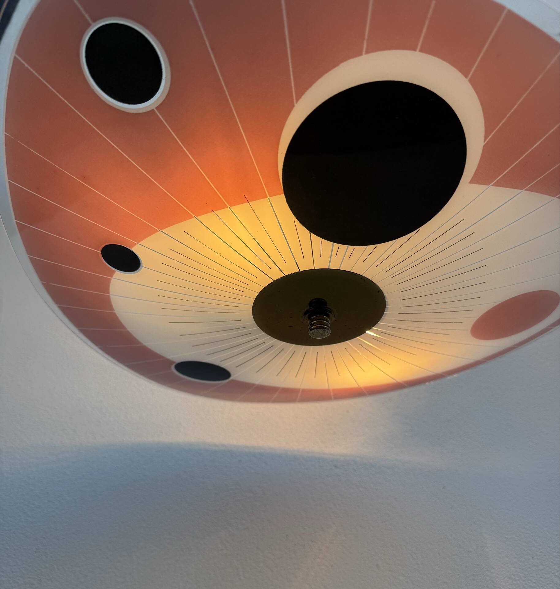 Screen-printed glass pendant from the 1960s