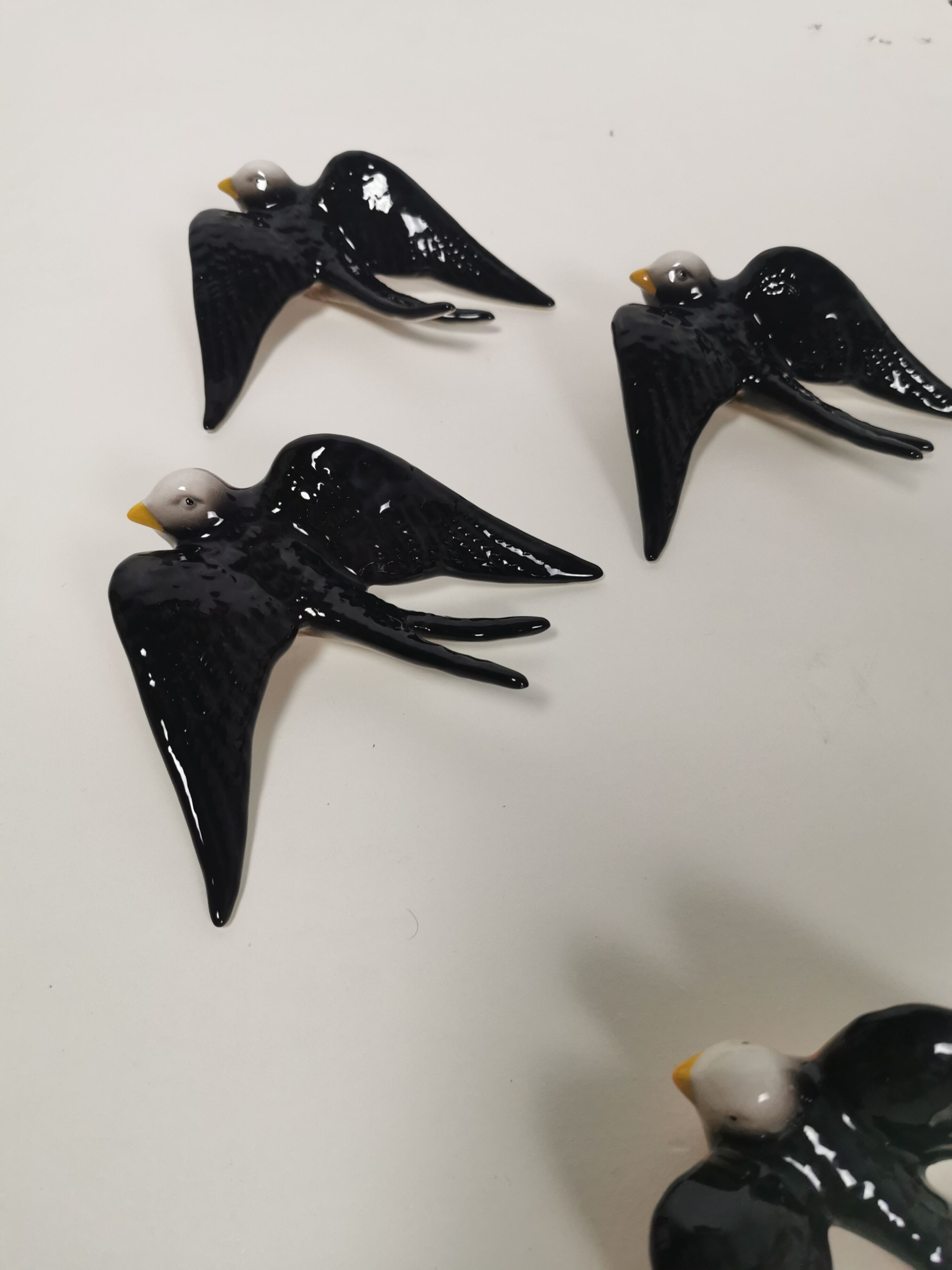 Batch of ceramic swallows