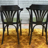 Paire de fauteuils type bistrot skai