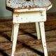 Workshop stool in antique patinated solid wood
