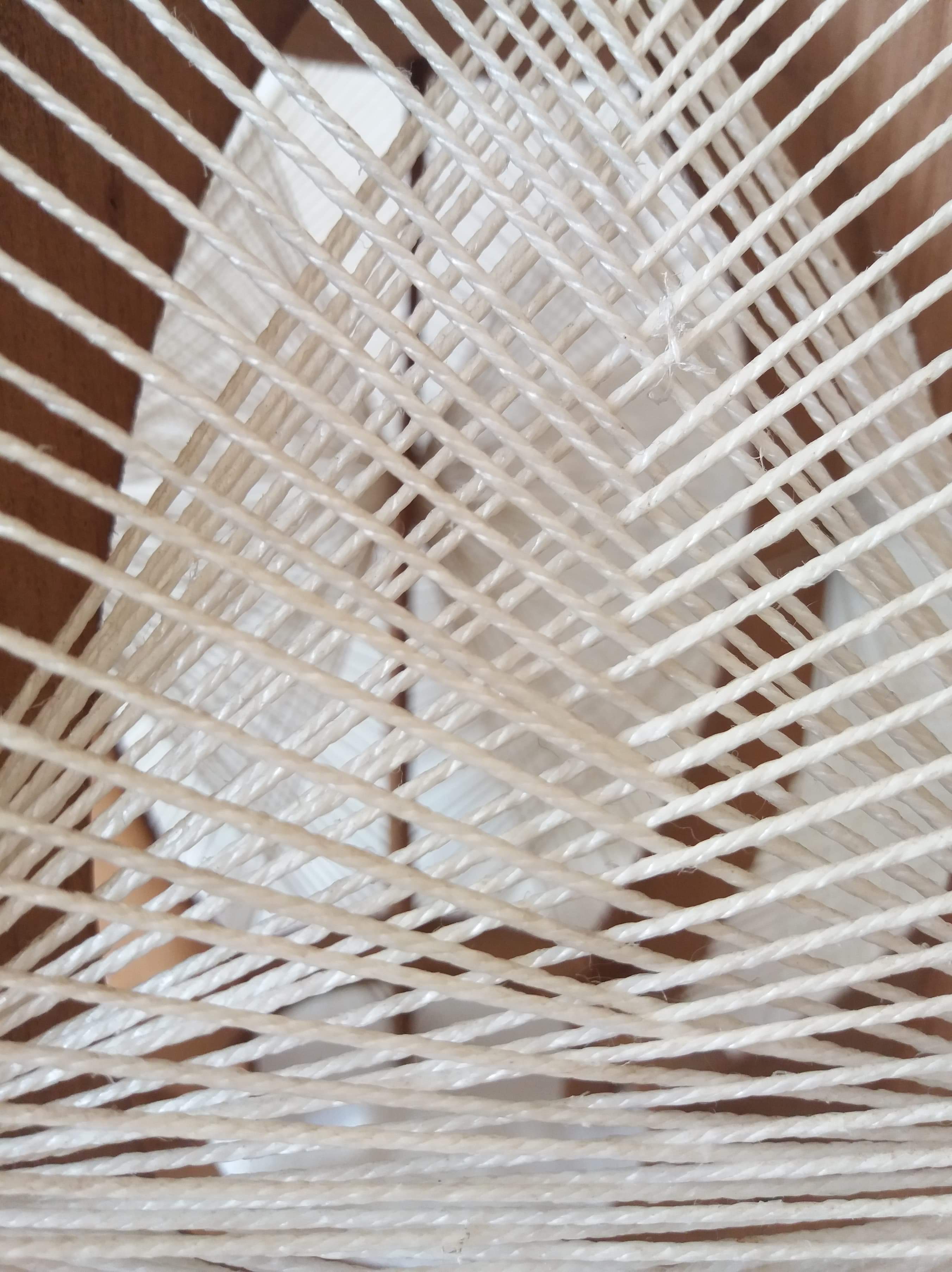 Scandinavian hanging lamp in wood and stretched wires