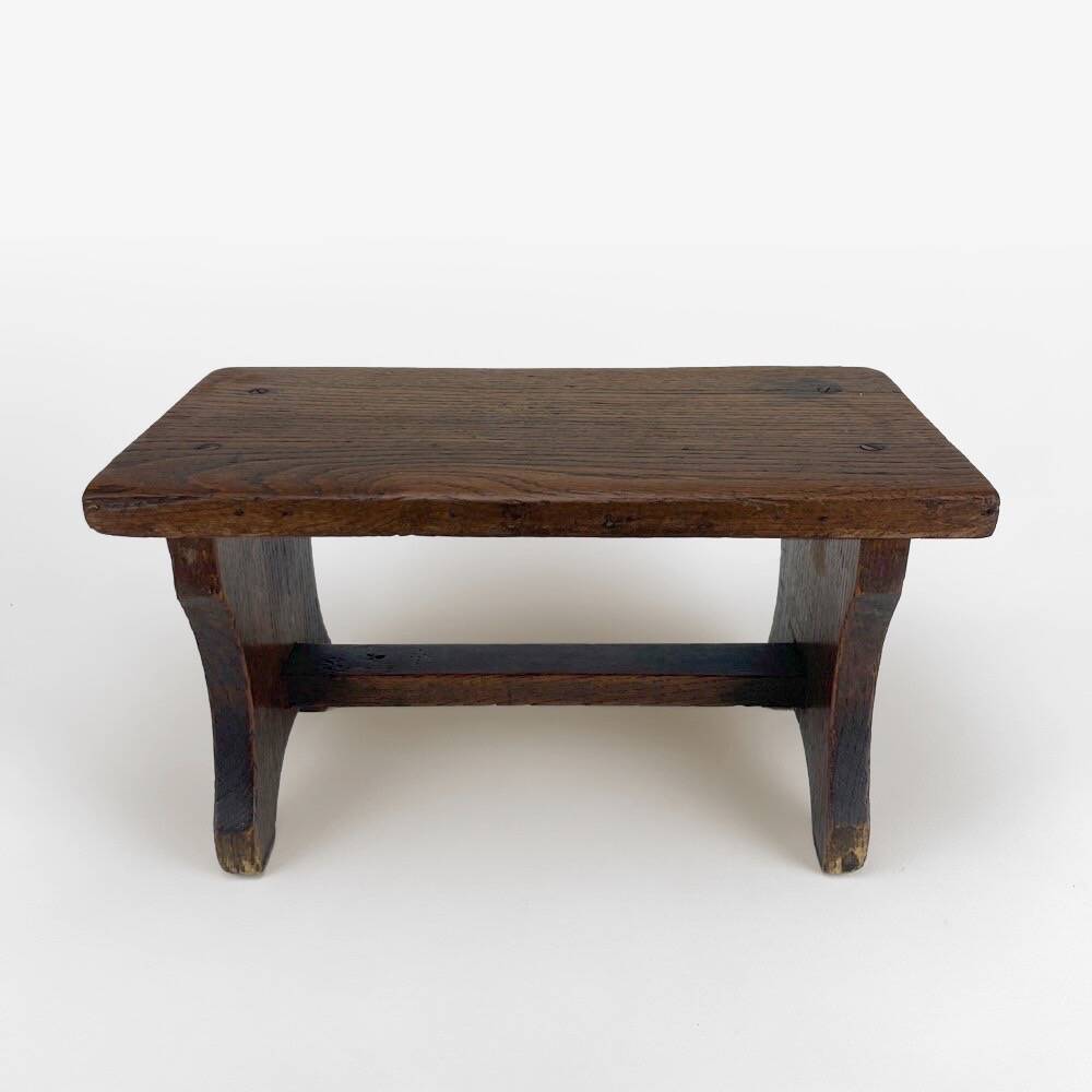 Small old wooden bench or footstool