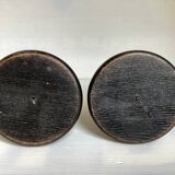 Pair of black stained wooden candlesticks