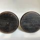 Pair of black stained wooden candlesticks