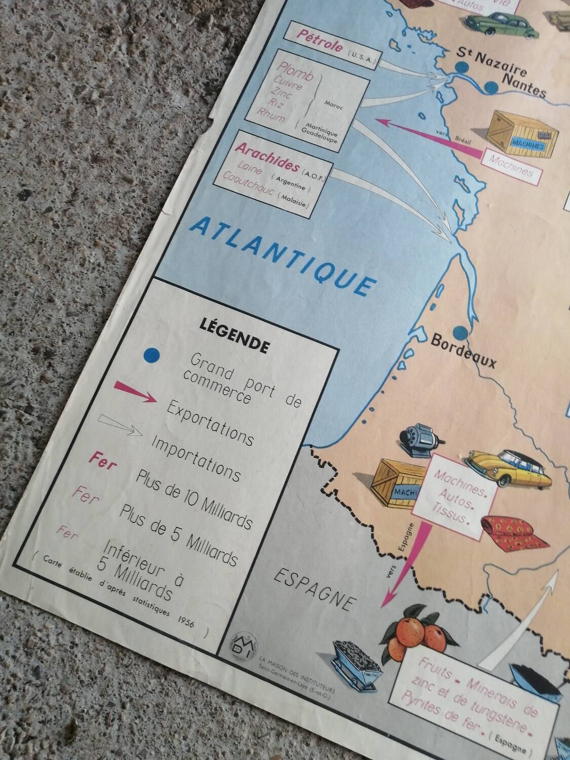 Vintage school map of France "Commerce and Clothing"