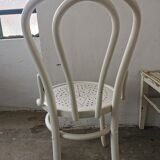 Set of 6 mismatched white chairs