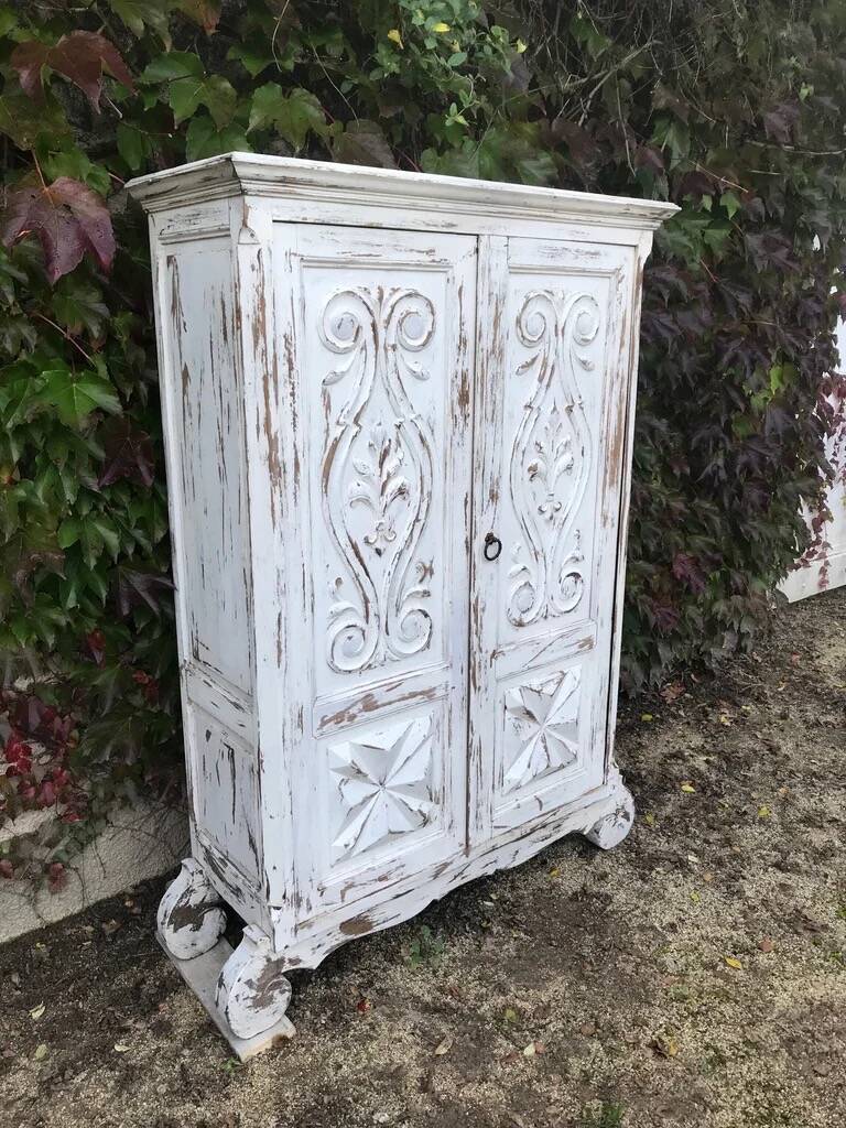 Rustic whitewashed wood cabinet