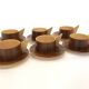 Vintage wooden cups and saucers in teak