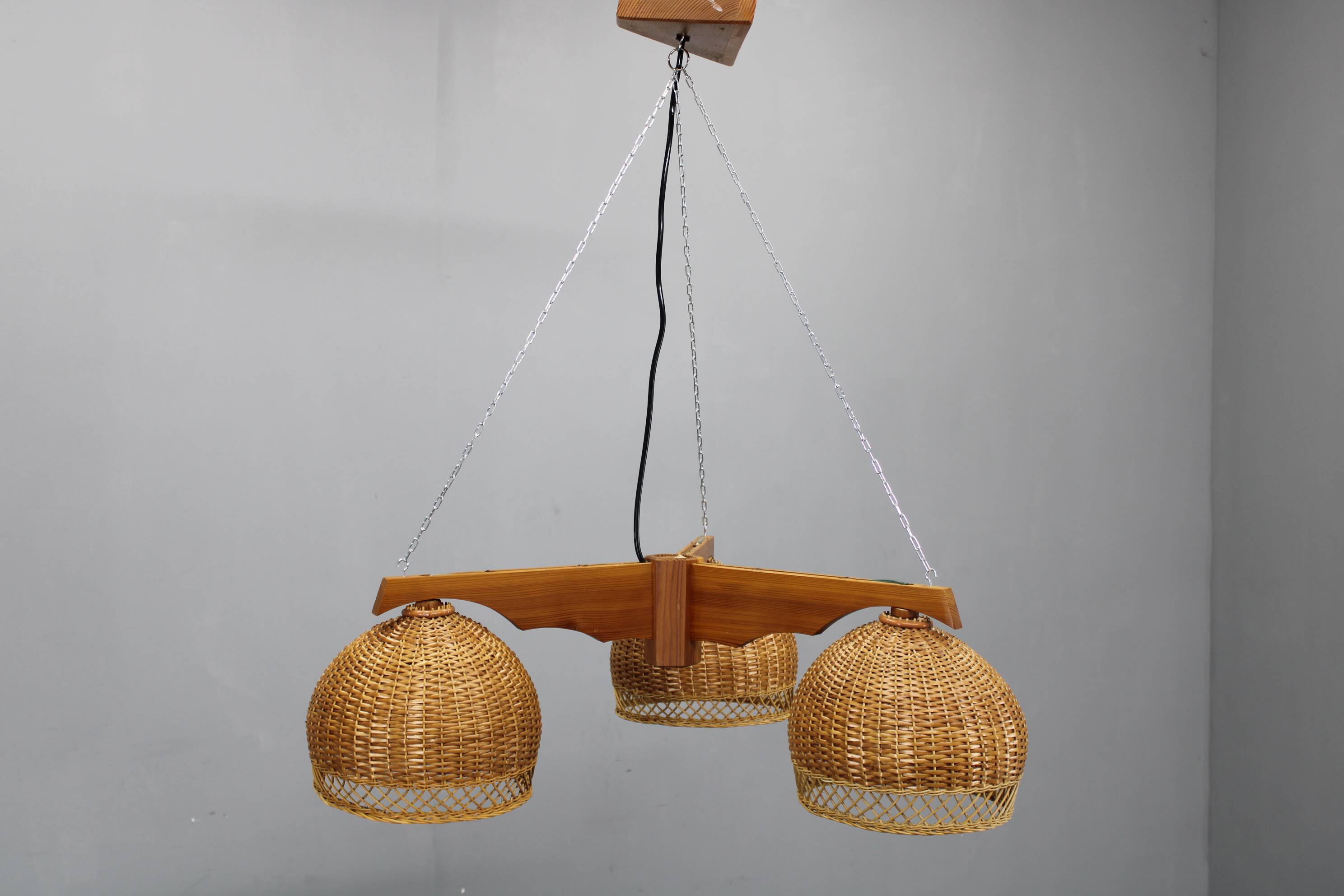 1970s Czechoslovakian rattan & pine pendant light, three-shade chandelier