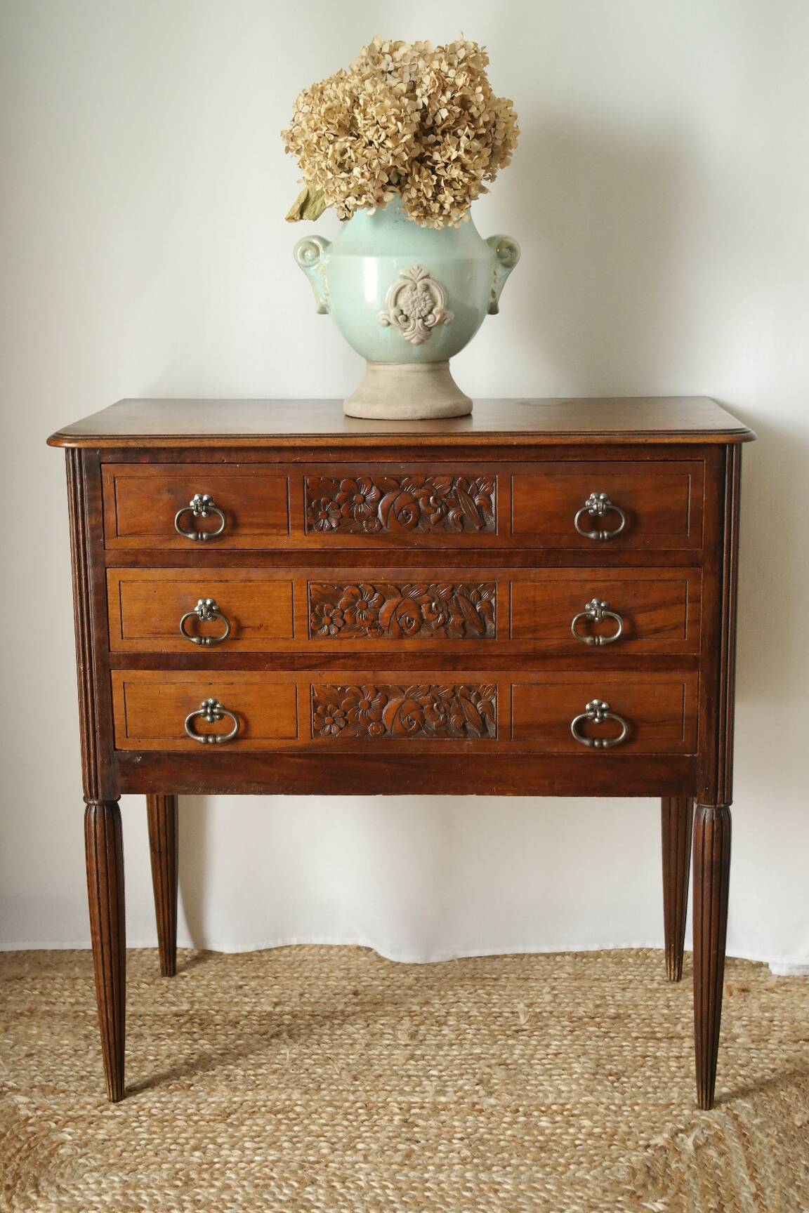 Solid walnut chest of drawers from the early 20th century.