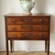 Solid walnut chest of drawers from the early 20th century.