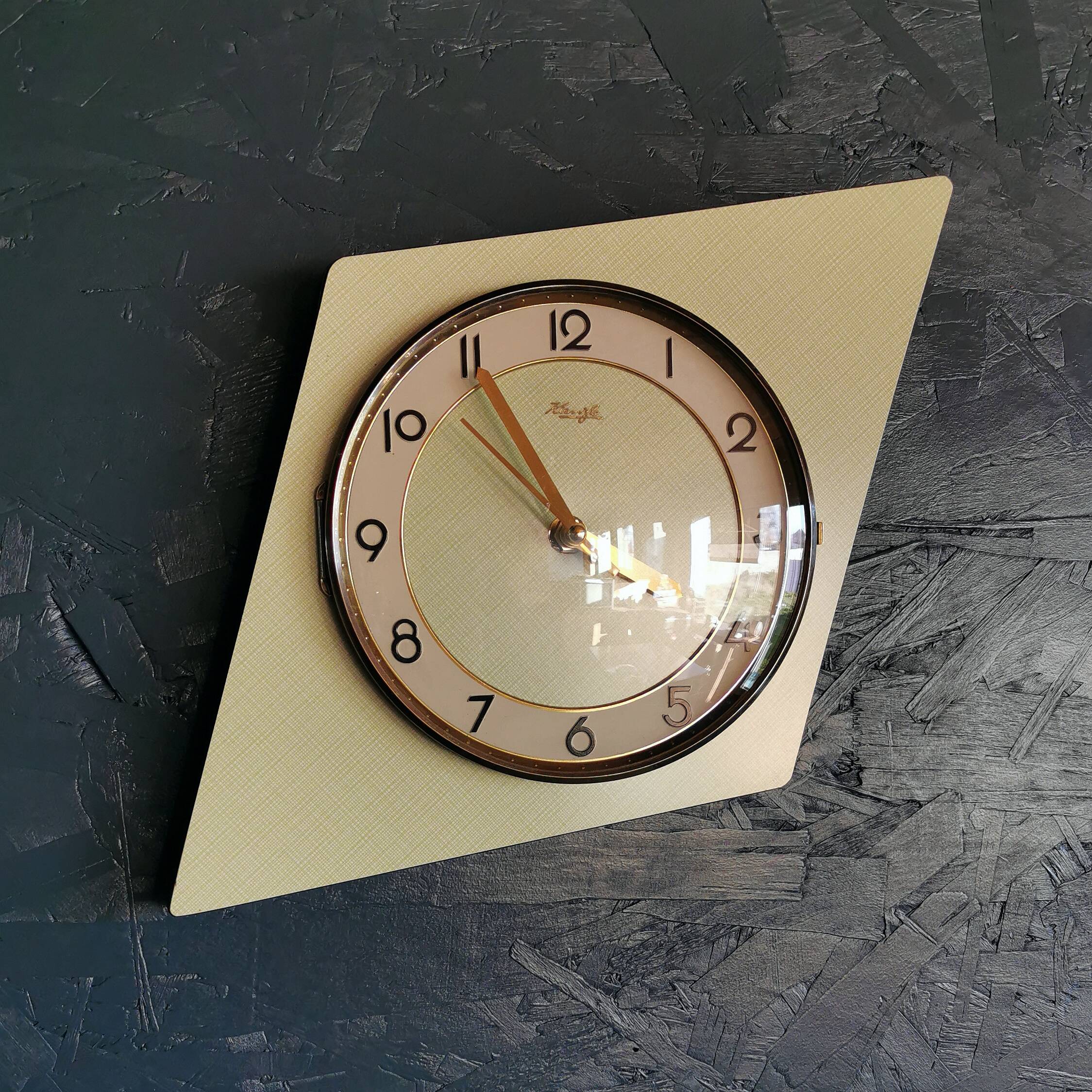 Vintage formica clock silent asymmetrical wall pendulum "Kienzle green"